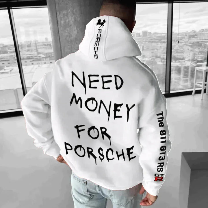 Flat lay van de unisex oversized racing hoodie. Trendy zwarte hoodie, perfect voor casual comfort en moderne mode.