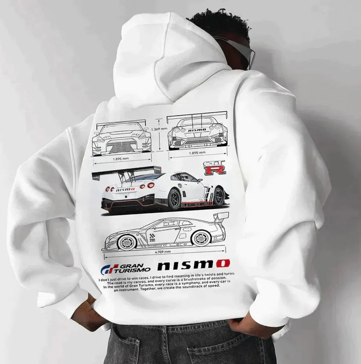Unisex oversized racing hoodie gecombineerd met jeans. Veelzijdige casual mode voor dagelijks comfort en een stoere look.