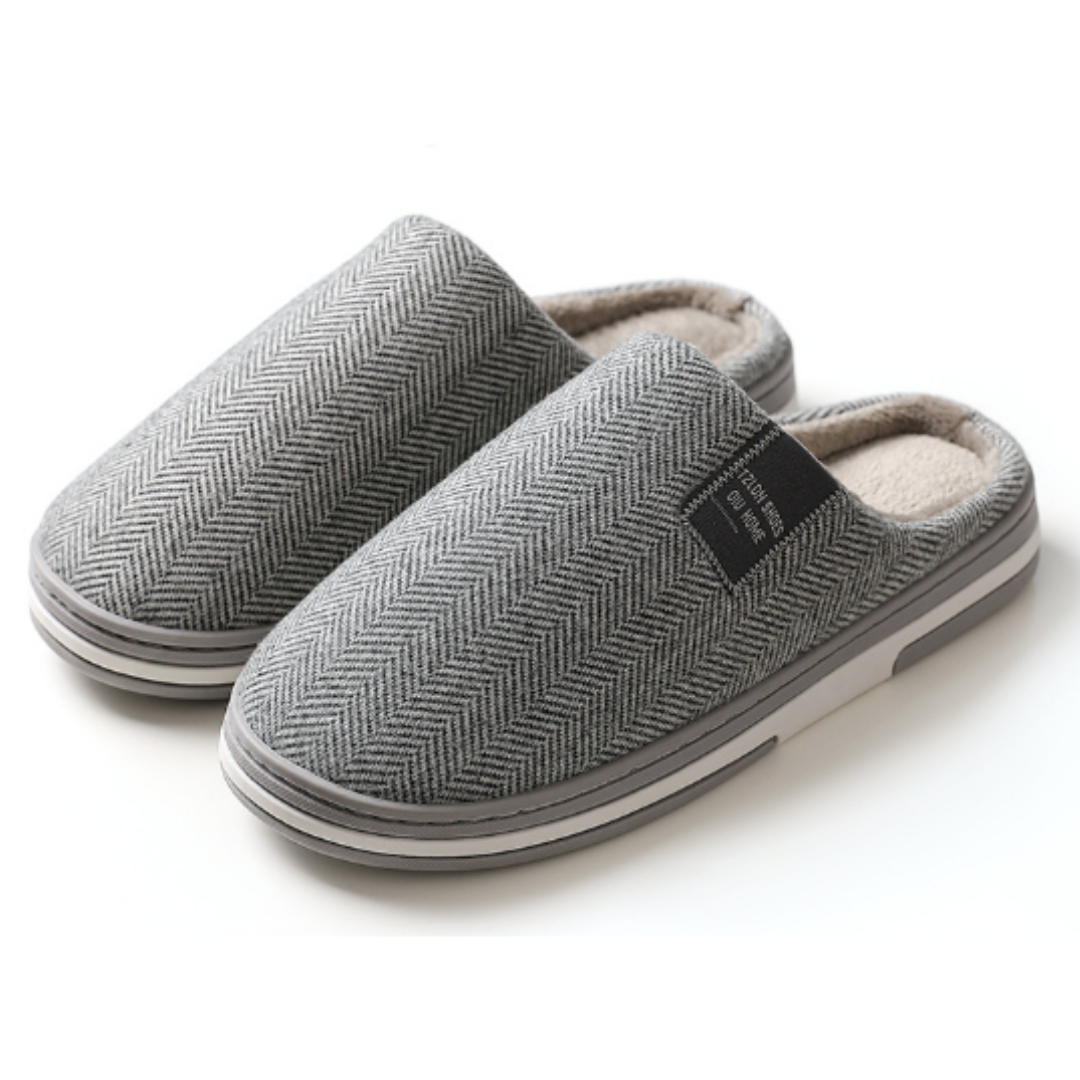 Antislip zool van stevige unisex pantoffels, voor extra veiligheid en grip op gladde vloeren thuis.