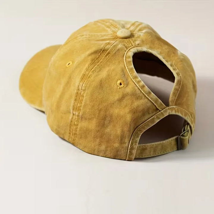 Casual unisex pet met gewassenlook en verstelbare band, perfect voor lente en zomer.