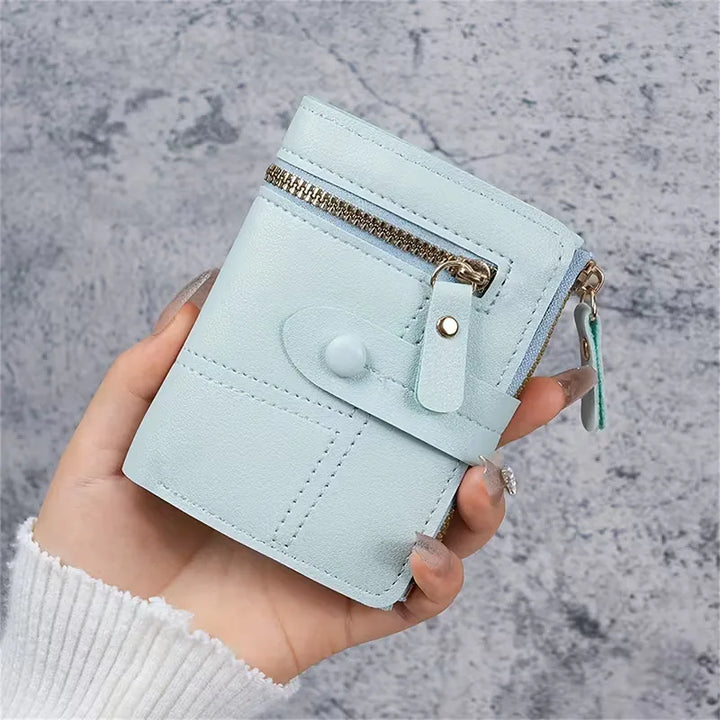 Unisex accessoire: stijlvolle compacte portemonnee met dubbele rits, perfect voor kaarten en biljetten.