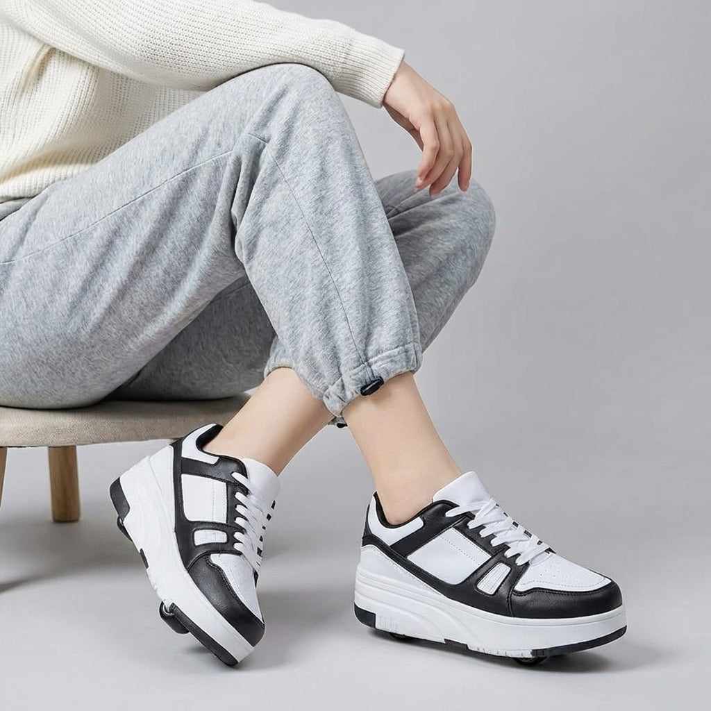 Kindersportschoenen met uitschuifbare wieltjes, zwart met blauwe accenten, ideaal voor buitenspeelgoed