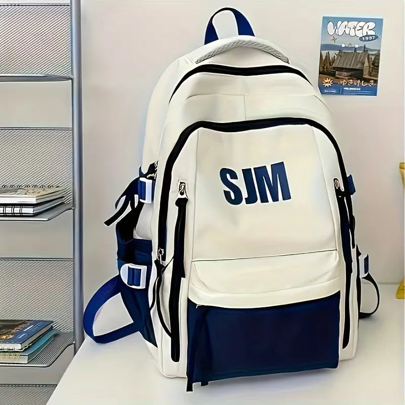 Zwarte unisex rugzak met grote capaciteit, geschikt voor school, werk en reizen. Comfortabel dragen.