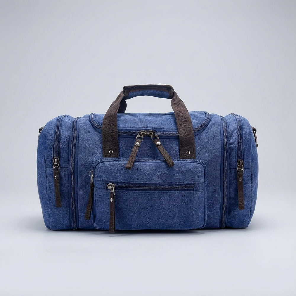 Detailopname van de duurzame canvas stof van de WeekenderPro weekendtas, ideaal voor frequent reizen.