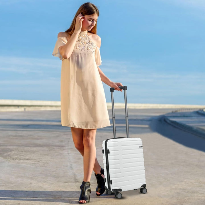 Compacte maar ruime harde koffer, uitbreidbaar, met TSA-slot en 360° spinnerwielen.