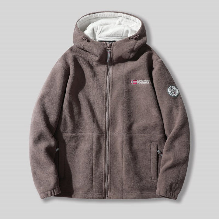 Unisex ultra warme fleece jas in zacht materiaal voor heren en dames, perfect voor koude winterdagen met praktische zakken.