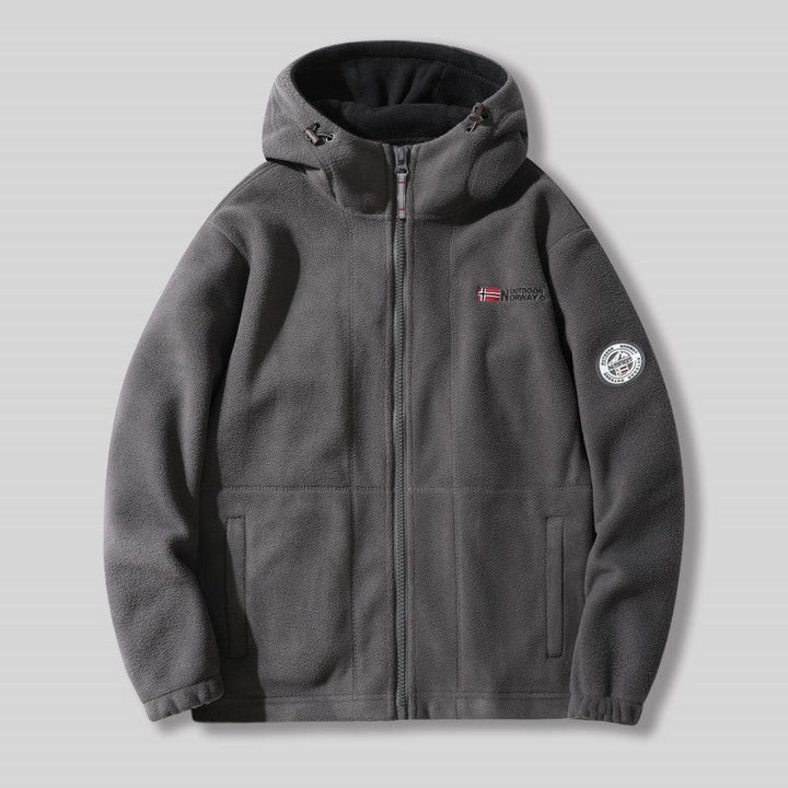 Unisex ultra warme fleece jas in zacht materiaal voor heren en dames, perfect voor koude winterdagen met praktische zakken.