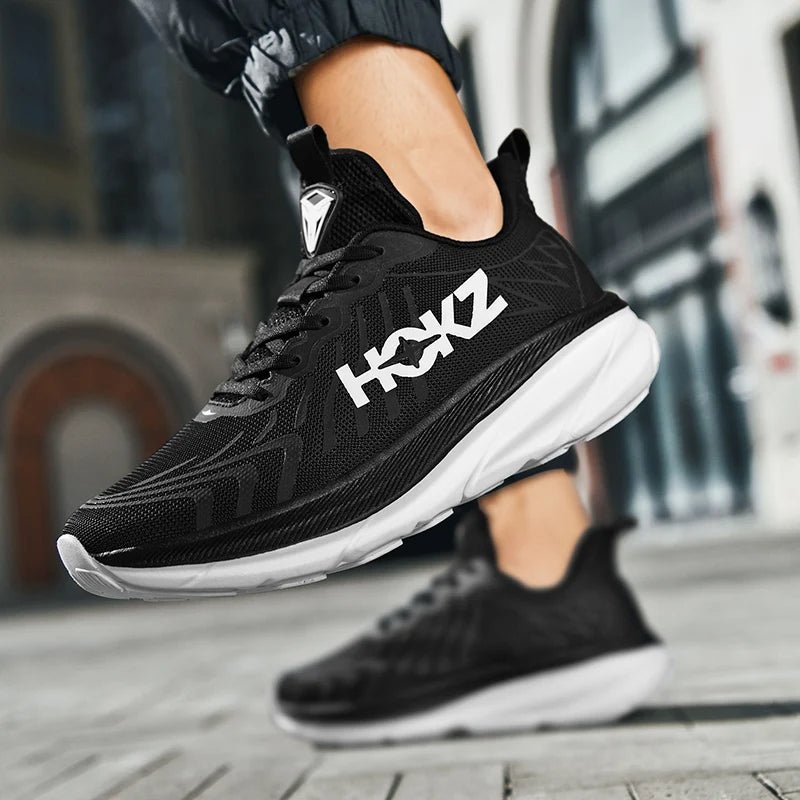 Bovenaanzicht van de unisex hardloopschoenen, met focus op de lichtgewicht constructie.