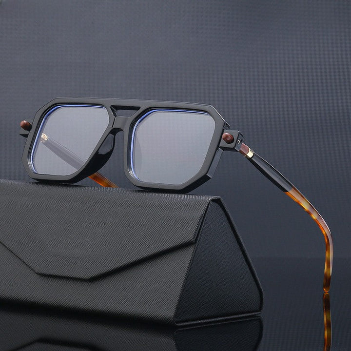 Unisex vierkante retro zonnebril met blauwlichtfilter, ideaal voor mode en oogbescherming.