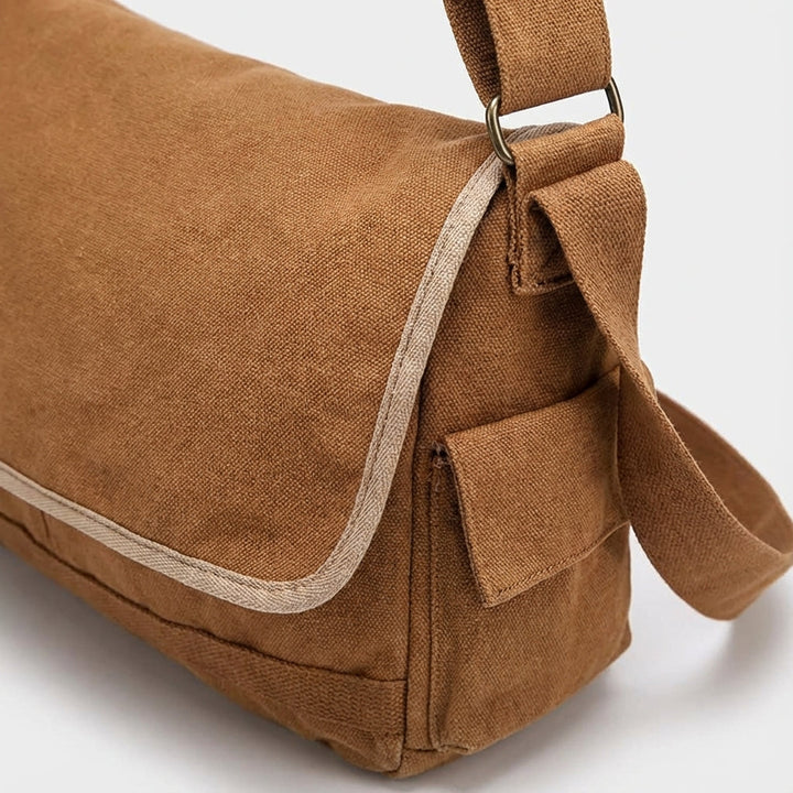 Vintage look canvas schoudertas, duurzaam en ruim, perfect als dagelijkse tas voor mannen en vrouwen.