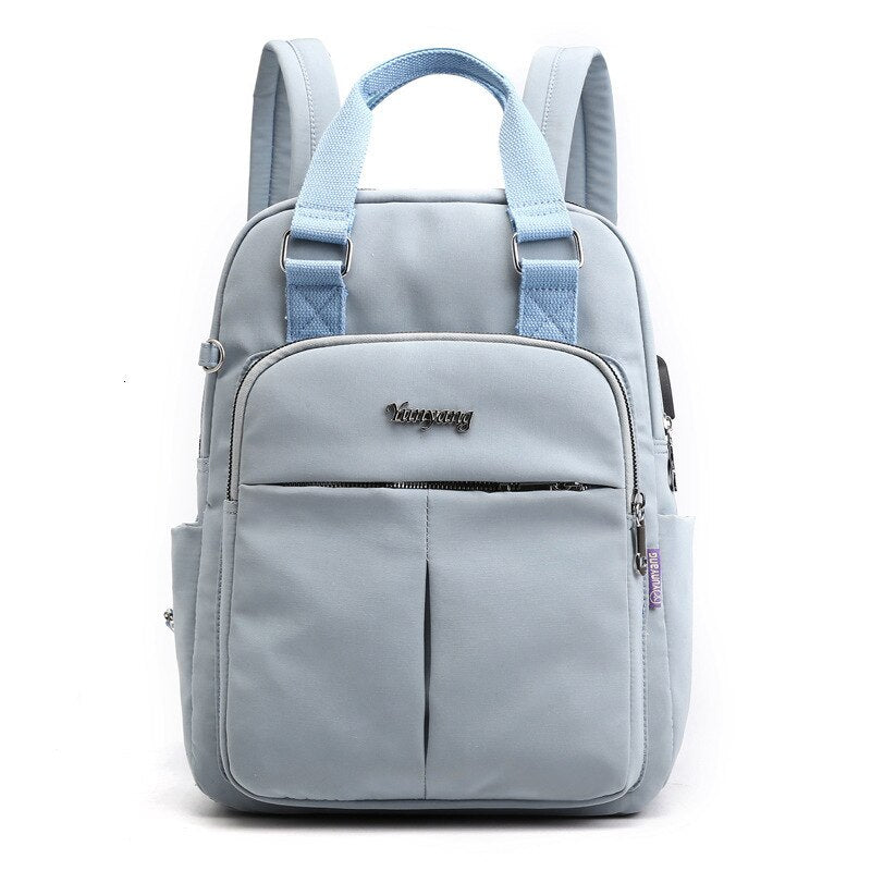 Anti-diefstal rugzak met verborgen ritsen & waterdicht nylon. Veilig voor laptop, ideaal voor reizen.