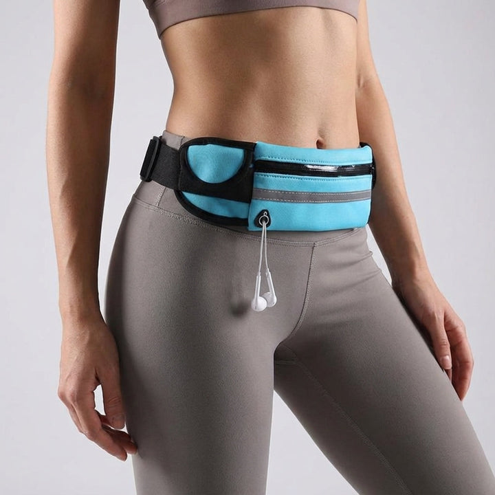 Comfortabele hardloopband/heuptas met veilige rits; ideaal voor je telefoon en sleutels tijdens het sporten.