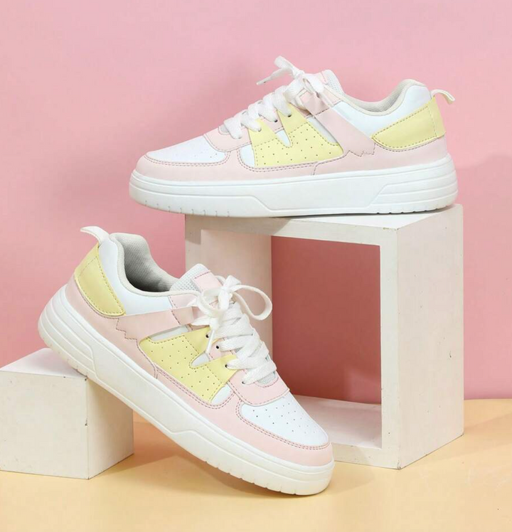 "Valeen sneakers voor dames, kleurrijk design met levendige pastelkleuren en ademend bovenwerk voor comfort en stijl."