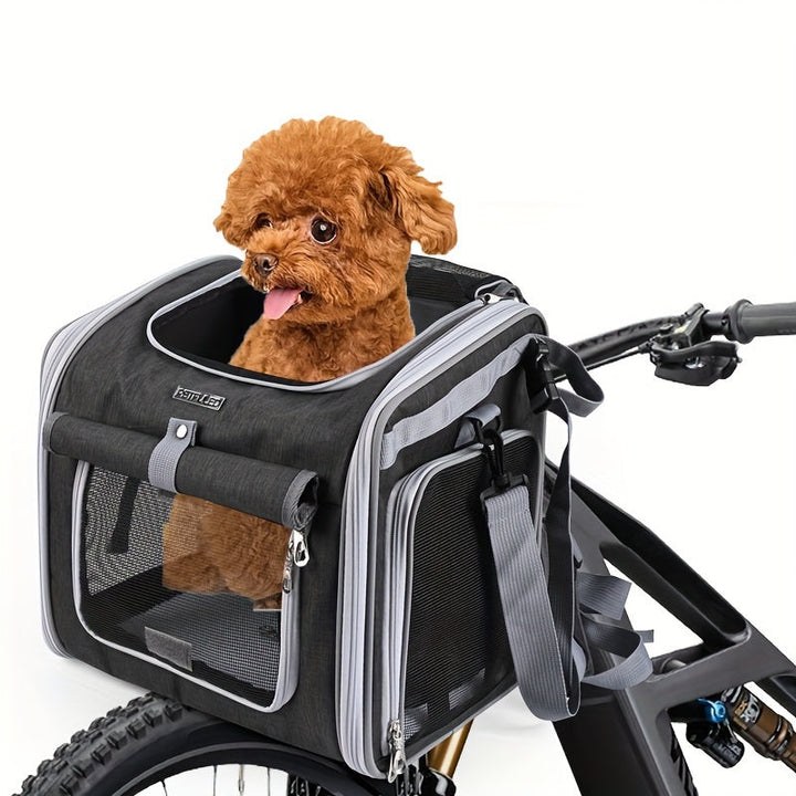 Veilige uitbreidbare fietsmand voor huisdieren met gaasvensters, geschikt voor honden en katten tot 8 kg.