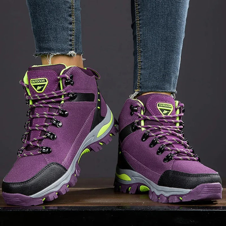 Veiligheidswerkschoenen voor dames, waterdicht en antislip, met versterkte enkelondersteuning en ronde teen, grijs.