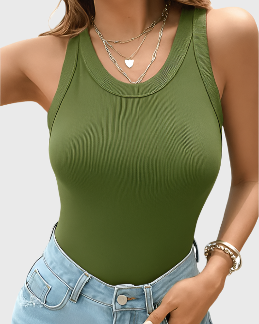 "Vormgevende geribde tanktop met ingebouwde BH, nauwsluitend, slankmakende pasvorm, rekbare ribstof in diverse kleuren."