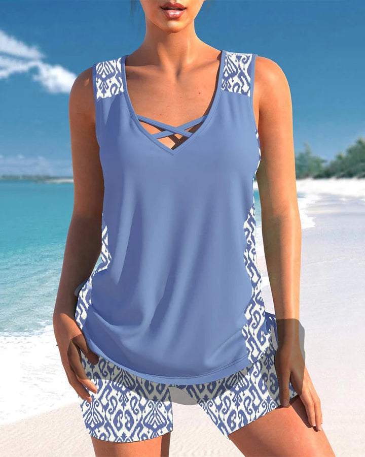 Zomerse tankini set met een strakke tankinitop en een bijpassende bikinislip. Comfortabele zwemkleding.