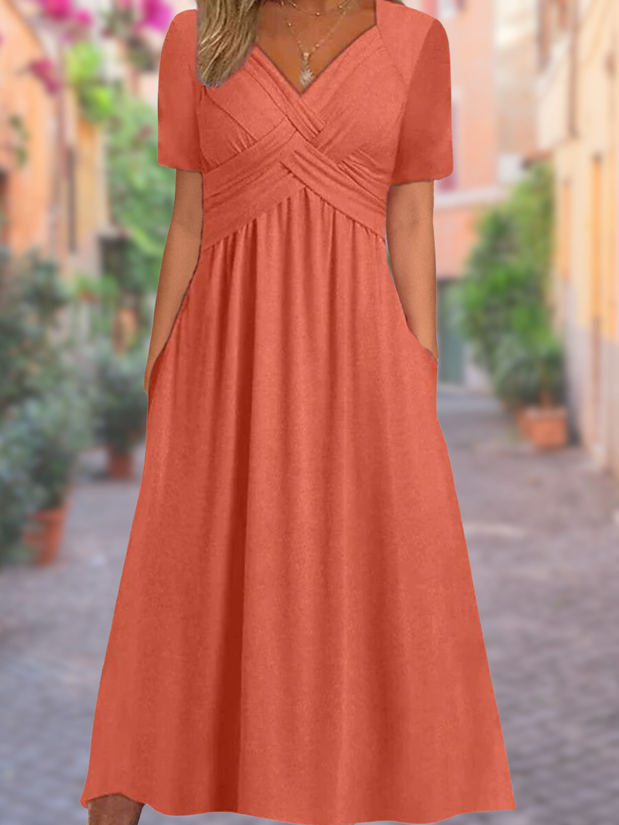 Vrouwen dragen elegante casual zwarte zomerjurk met v-hals, ideaal voor strand of vrije tijd.