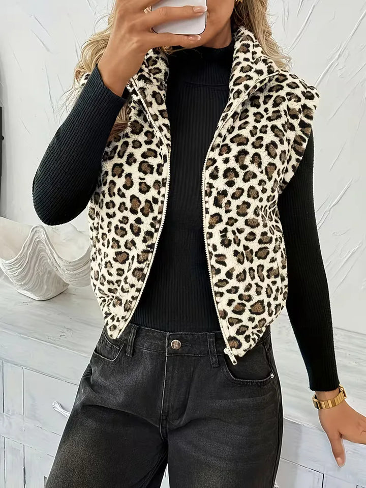 Stijlvol dames vest van faux shearling, mouwloos ontwerp met functionele rits.