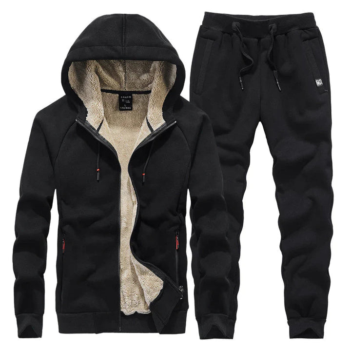 Stijlvol heren joggingpak met capuchon in een warme stof. Perfect voor sport, ontspanning of als comfortabele casual outfit.