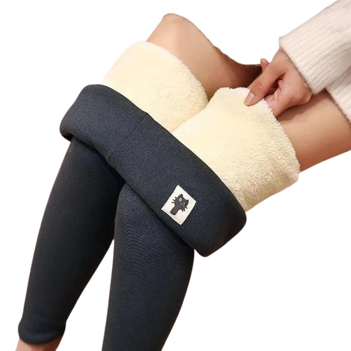 Stijlvolle dames thermolegging met hoge taille, perfect voor mode en warmte tijdens koud weer.