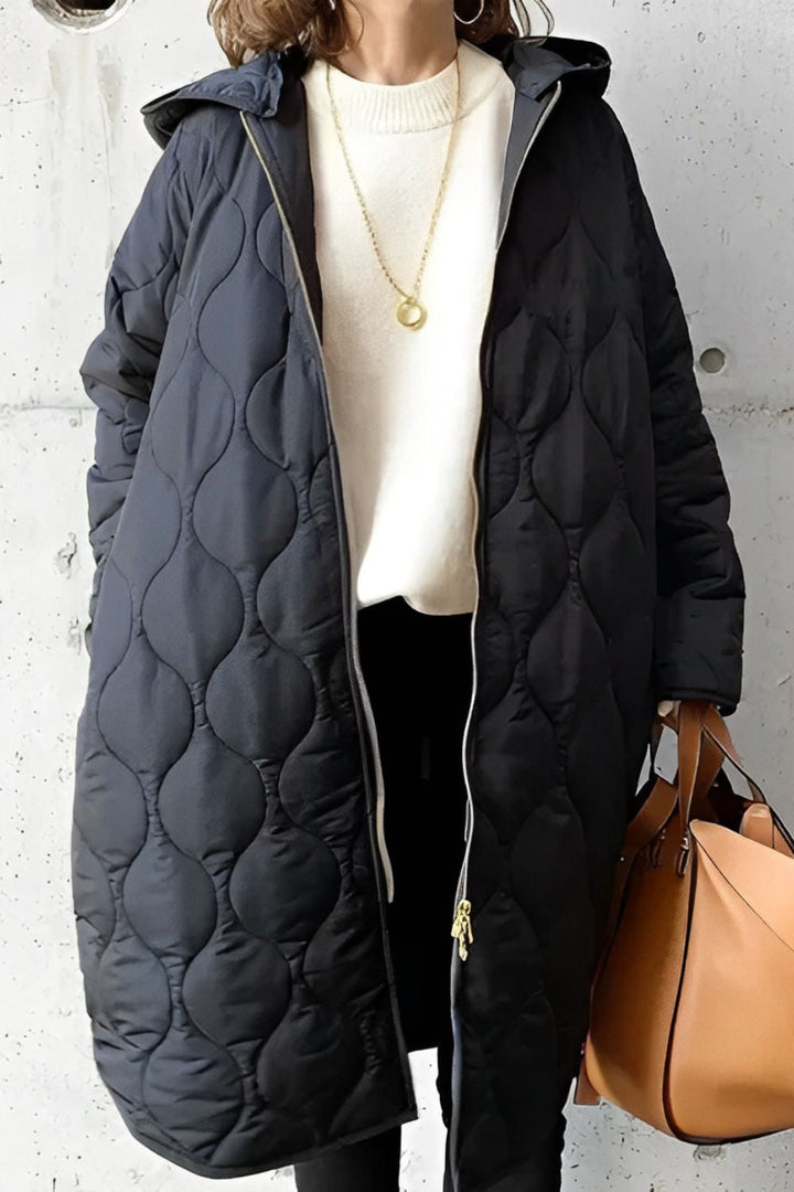 Nieuwe collectie dames winterjas: comfortabel, modieus, met capuchon en lange pasvorm