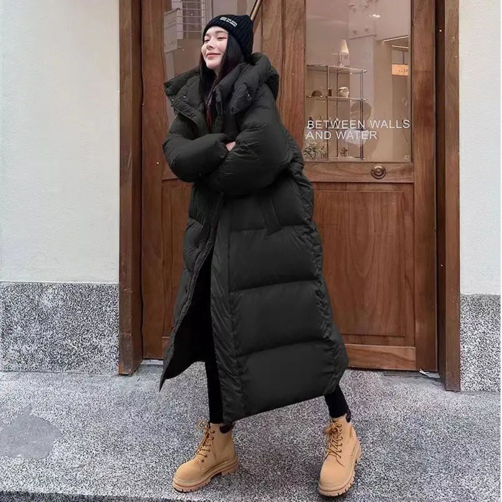 Warme lange donsjas voor dames met donsvoering, elegant ontwerp. Beschikbaar in zwart, roze, groen, en beige.