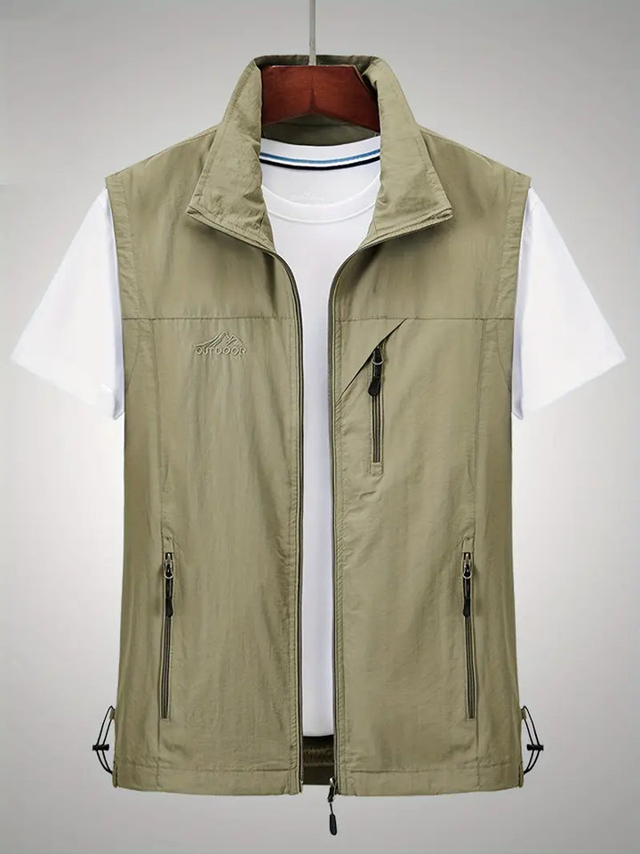 "Waterdicht heren vest, mouwloos, met rits. Ideaal voor regenachtige dagen. Blauw, groen, zwart opties. Comfortabel en stijlv