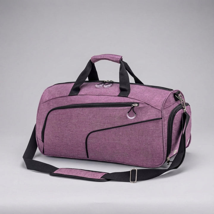 Overzicht van diverse kleuren: grijs, zwart, blauw en paarse 35L waterdichte FlexDuffel reistassen.