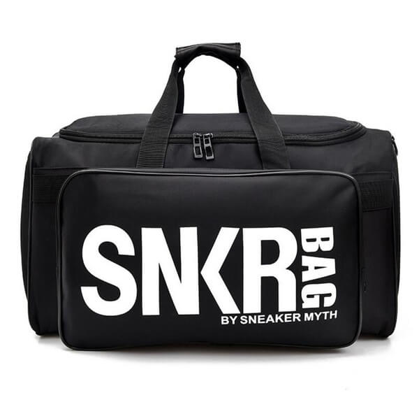Ultieme reisorganizer: waterbestendige tas met meerdere vakken voor sneakers, sportgear en bagage.