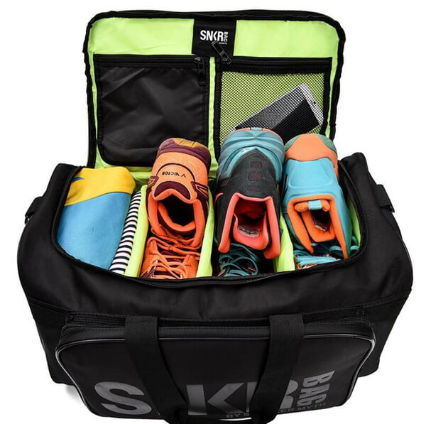 Stijlvolle unisex sporttas, waterbestendig, met speciaal vak voor sneakers, voor georganiseerd reizen.