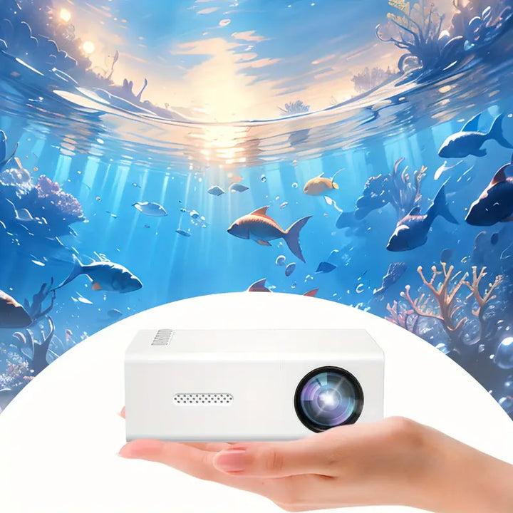 Bovenaanzicht van de Aurora draadloze projector, compact design met bedieningsknoppen, draagbaar.