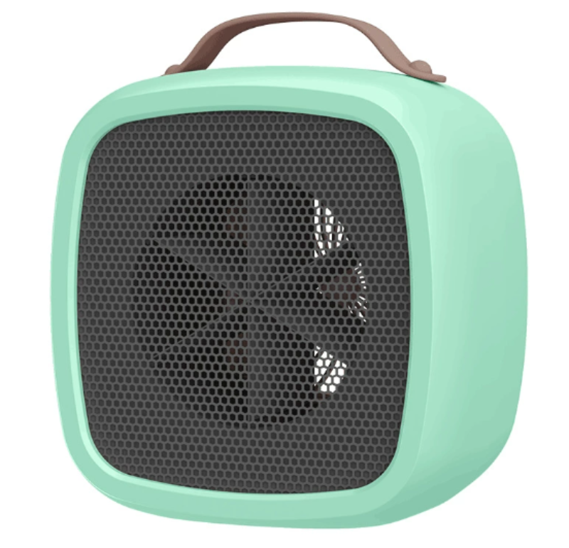 Groene compacte ventilatorkachel op een houten vloer, zorgt voor winterwarmte en zomers comfort in huis.