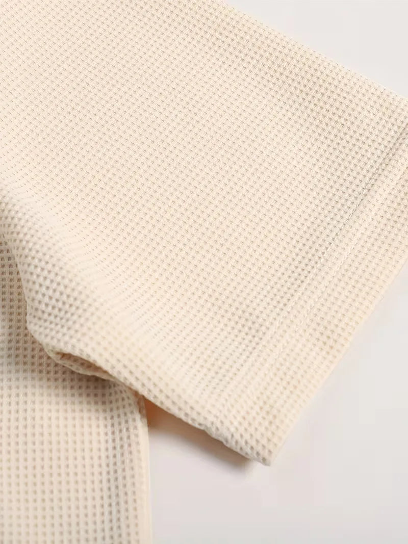 Modieuze herenpolo met knopenrij en korte mouwen, ideaal voor een frisse zomerlook.