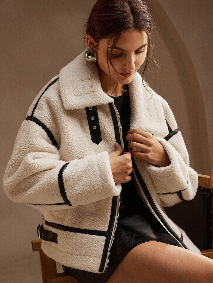 Modieuze oversized witte teddyjas voor dames, warme winterjas voor een trendy en comfortabele look.