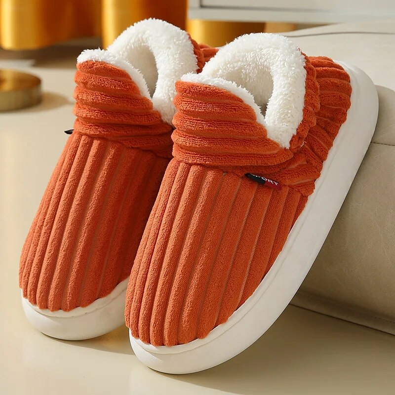 Close-up van de textuur van deze zachte dames pantoffels, ontworpen voor ultiem comfort thuis.
