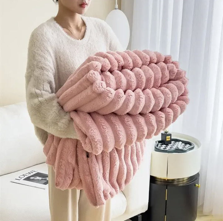 Comfortabele zachte aurora woondeken, perfect als warme accessoire in elke slaapkamer.