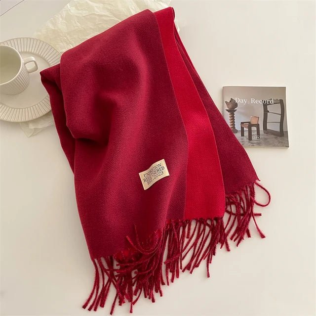 Damessjaal van pure wol in een elegante kleur, warm en zacht.