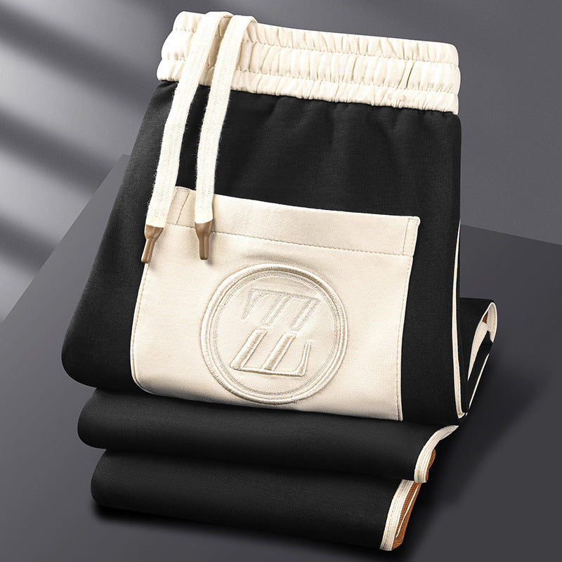 "Zephyr premium tracksuit met sportieve strepen, zachte lycra stof, elastische pasvorm, perfecte voor sport en vrije tijd."