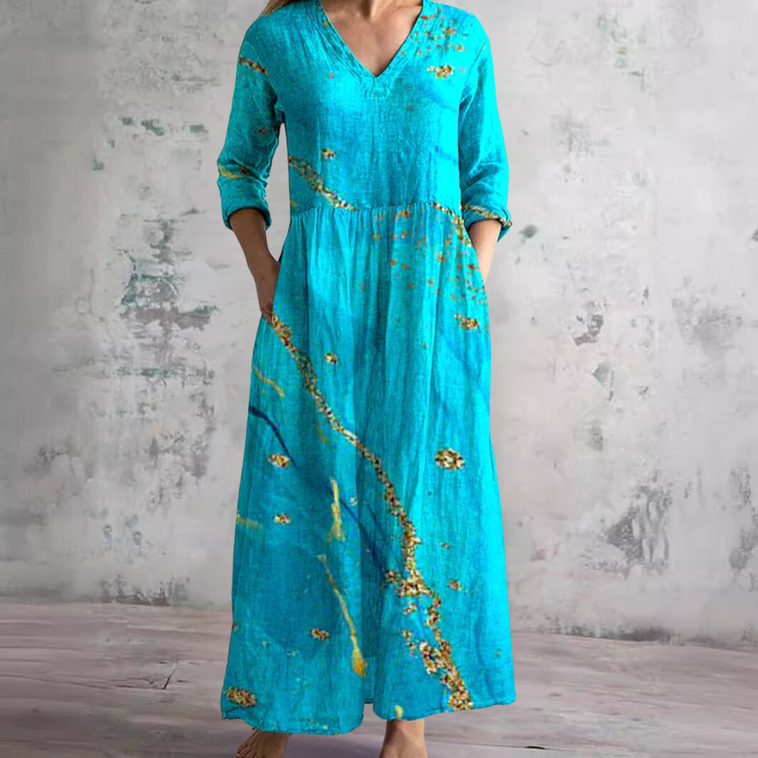 Zomerjurk met elegante V-hals en romantisch bloemenpatroon, perfect voor dames, comfortabel en luchtig voor warme dagen.