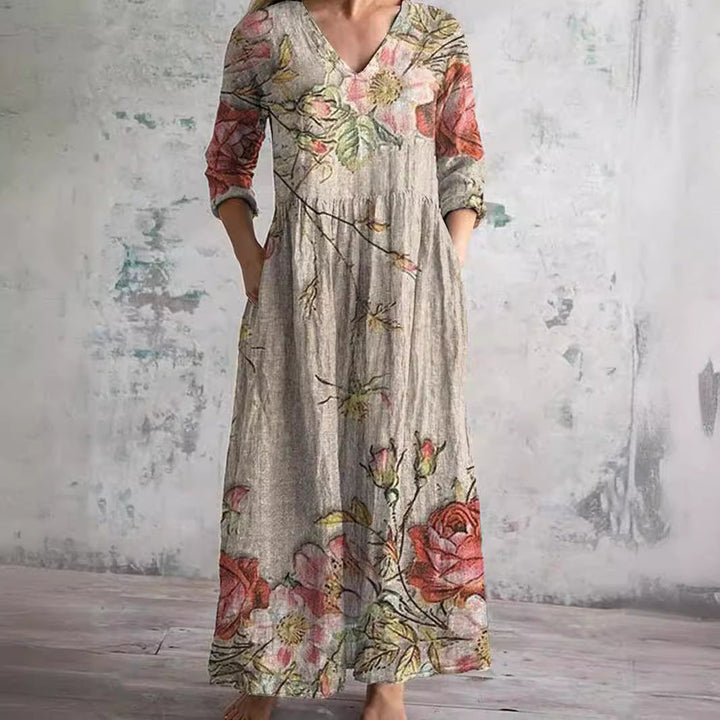 Zomerjurk met elegante V-hals en romantisch bloemenpatroon, perfect voor dames, comfortabel en luchtig voor warme dagen.