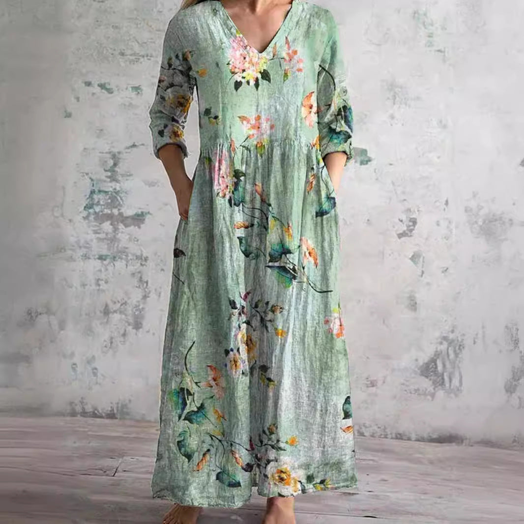 Zomerjurk met elegante V-hals en romantisch bloemenpatroon, perfect voor dames, comfortabel en luchtig voor warme dagen.
