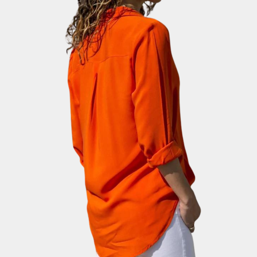 "Zomers gele damesblouse, comfortabel en elegant, gemaakt van ademend katoen, geschikt voor diverse gelegenheden."