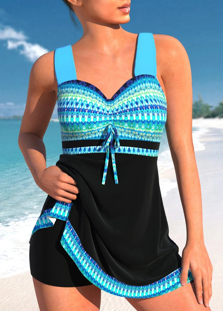 Blauwe tankini met rokdetail, ondersteunende zwemkleding voor dames met grote maten. Perfecte strandkleding.