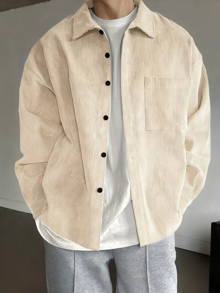 Heren overhemd met lange mouwen en subtiele ribstructuur, geschikt voor zakelijk casual.