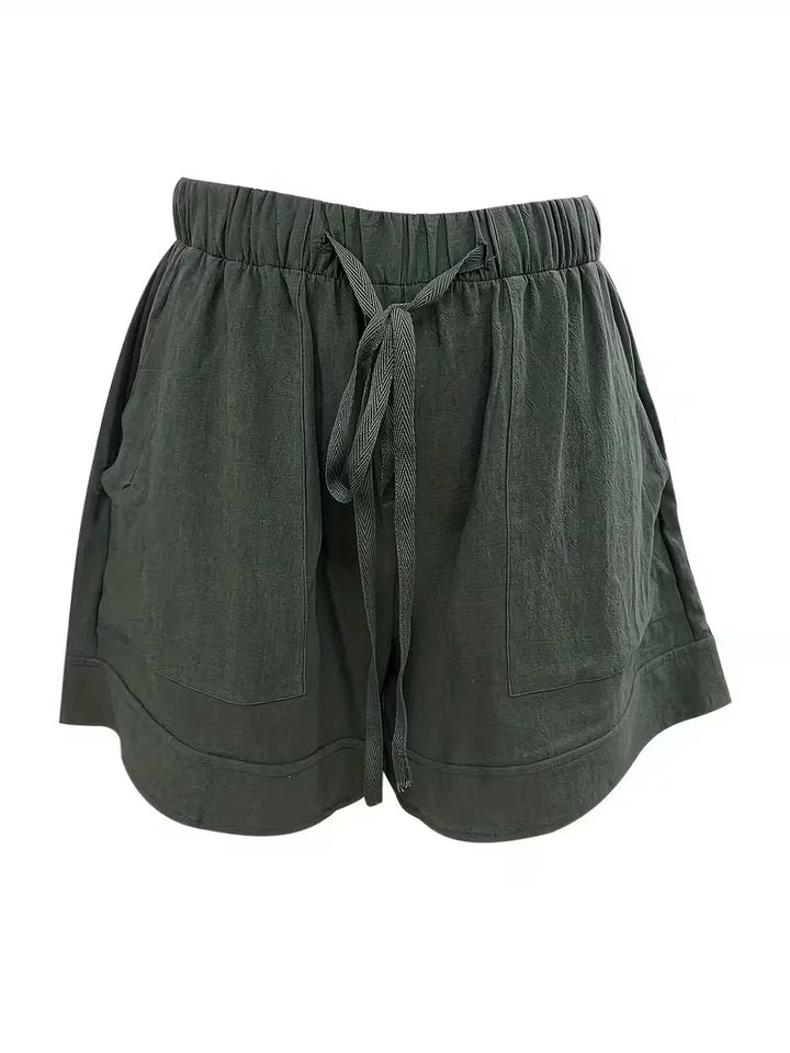 Marineblauwe dames shorts, trekkoord en wijde pijpen. Comfortabel voor warme dagen.