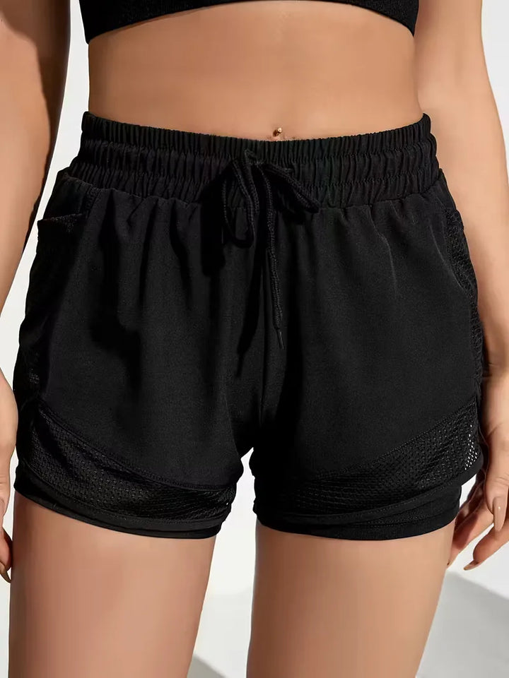 Petrol ademende dames short, comfortabel en casual met elastische tailleband.
