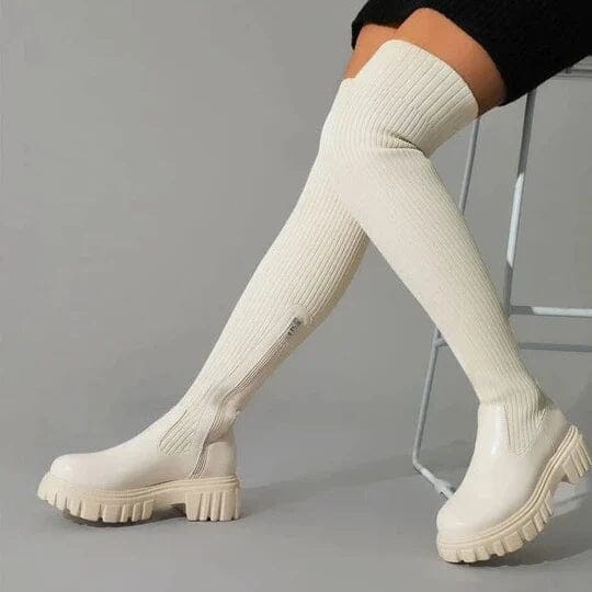 Witte dames stretch laarzen die elegantie en comfort combineren; een must-have voor damesschoenen.