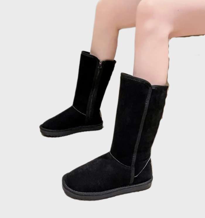 Stijlvolle bruine dameslaarzen met ritssluiting, ideaal voor winterse dagen en comfortabel dagelijks gebruik.