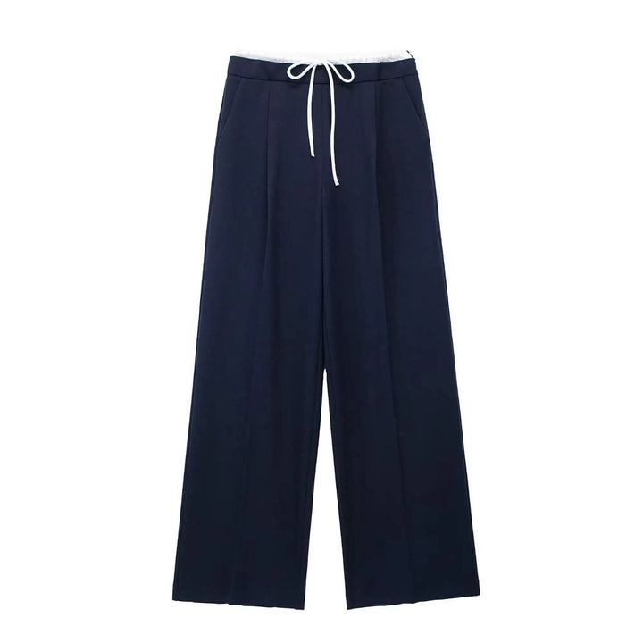 Comfortabele damesbroek met dubbele tailleband, verkrijgbaar in zwart, beige en marineblauw.